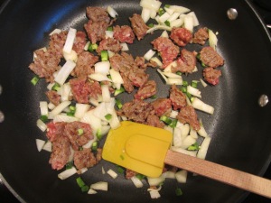Onion and jalapeno added to pan.