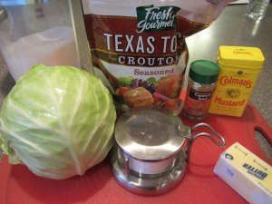 Ingredients:  butter, seasoned croutons, dry mustard, caraway seed, green cabbage, Kosher salt, and sugar.