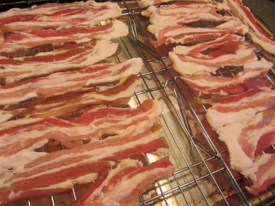 Cooking bacon the Alton way - on a rack in a cold oven set to 400 degrees.