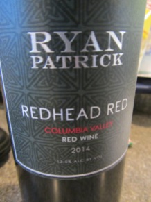 A bottle of wine for macerated berries.
