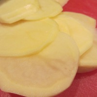 Thin potato slices.