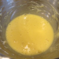 Egg yolks, tempered by gradually adding some of the hot roux.