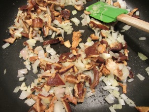 Chopped shiitakes added to skillet.