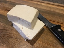 Firm tofu, cut in half.