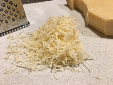 Finely grated Parmesan.