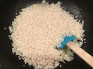 Arborio rice added to the onion/butter.