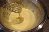 Yolks/sugar whisked until a thick ribbon falls from the whisk.