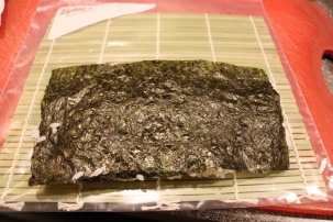 Nori and rice flipped over.