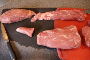 Butchered tenderloin. The meat in the upper left is the head muscle that is for a stuffed roast.