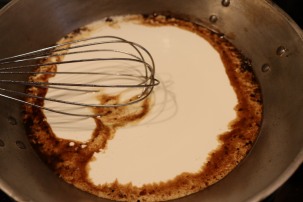 Cream added to the pan.