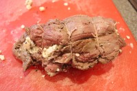 Head roast stuffed with blue cheese, rolled, and tied.